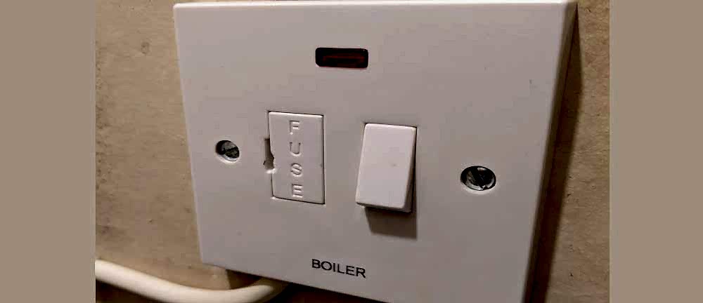 boiler at the fuse switch or fuse spur